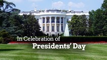 In celebration of Presidents' Day. The White House with trees, bushes, and grass.